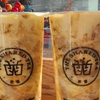 Signature Black Milk Tea · Upgrade to large for additional charge.