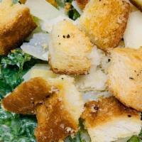 Lg Caesar Salad · Romaine, Caesar dressing, shaved Parmesan, croutons