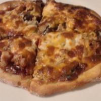 Bbq Chicken Pizza · Chicken, mushrooms, onions, cheddar cheese & mozzarella cheese with bbq sauce.