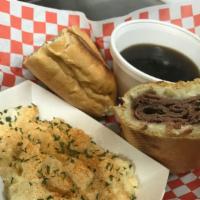 French Dip Sandwich · Roast beef heated in au jus then toasted with cheese.