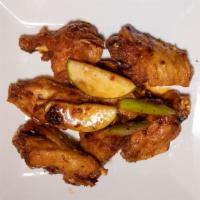 Cunard Wings · chicken wings tossed in our chili cider glaze served with sliced apple