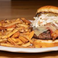 Boston & Albany Burger · sweet apple and cabbage slaw, whiskey candied bacon, cheddar cheese, on a grilled beef patty...