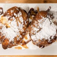 Harbor Beignets · light and fluffy quick fried donuts filled with marshmallow fluff, coated with raised sugar ...