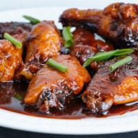 Thai Wings (12 Pieces) · Hot and sweet wings.