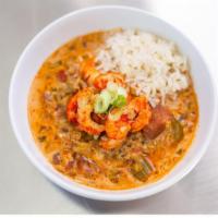 Etouffee - Single · Creamy seafood stew with seasonal veggies served over hot rice