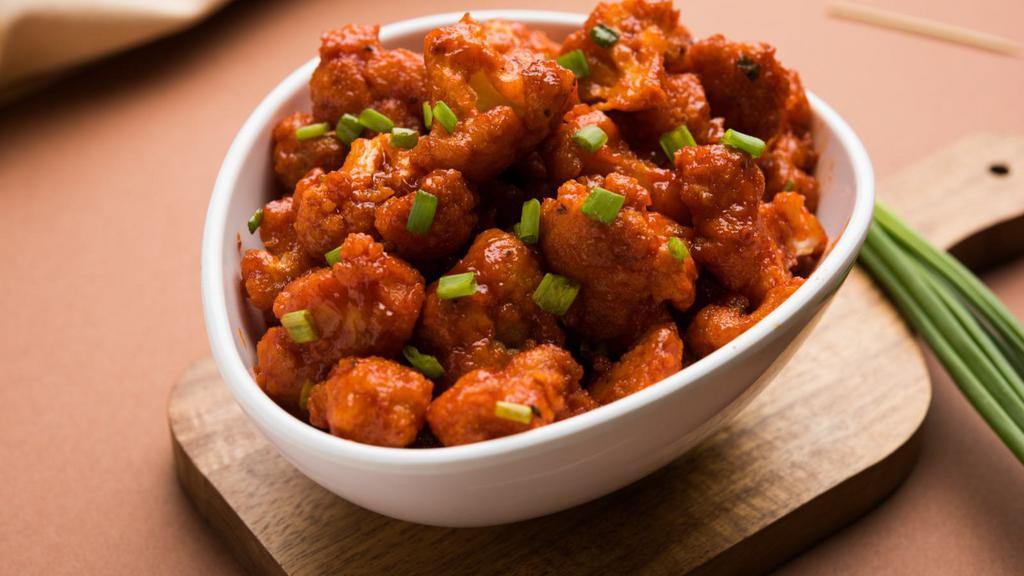 Gobi Manchurian · Deep-fried and deliciously battered cauliflower cooked in a spicy soya sauce.