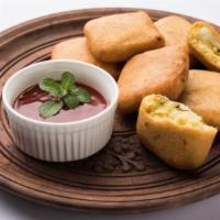 Paneer Pakora · A deliciously battered cottage cheese snack, dipped in flour batter, mixed Indian spices and...