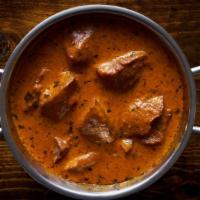 Lamb Tikka Masala · Delicious and juicy tender lamb pieces, cooked in a tandoor and sautéed in rich cream sauce.