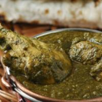 Chicken Saag · Delicious tender chicken sautéed with various Indian herbs, cooked in spinach.