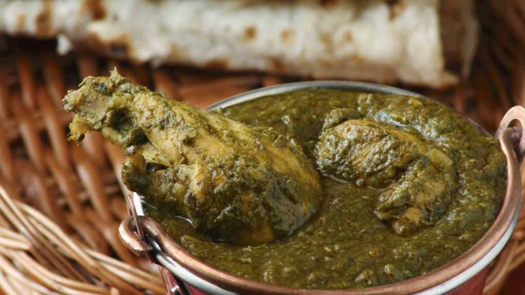 Chicken Saag · Delicious tender chicken sautéed with various Indian herbs, cooked in spinach.