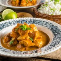 Chicken Shahi Korma · Delicious tender chicken flavored with cardamom sweet and spicy cream, mixed with cashews an...