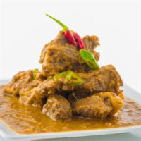 Goat Dopiaza · Delicious marinated bone-in goat, cooked with fresh onions, tomatoes, bell peppers and vario...