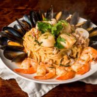 Seafood Pescatore · U-10 scallops, calamari, mussels, clams and jumbo shrimp in red or white sauce. Served over ...