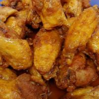 2 Pounds Traditional Wings · 2 pounds of wings shaken in our famous house made sauces.  Comes with 2 homemade dipping sau...