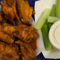 1 Pound Traditional Wings · 1 pound of wings shaken in our famous house made sauces.  Comes with 1 homemade dipping sauce.