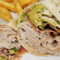 Chicken Salad Wrap · Fresh made chicken salad with lettuce and tomato.