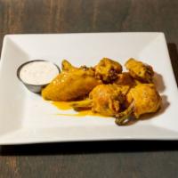 Chicken Wings · Fried golden brown and served with ranch dressing (*g, *v+)