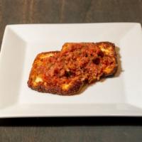 Fried Cheese · Cornmeal crusted and pan seared qhueso blanco served with a side of warm salsa.  (*g)