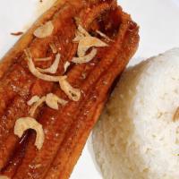 Honey Baked Eel · Our honey baked eel is served over your choice of rice.