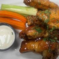 6 Smoked Chicken Wings · Tossed in bbq, hot, sweet chili, jerk or naked with ranch. or blue cheese