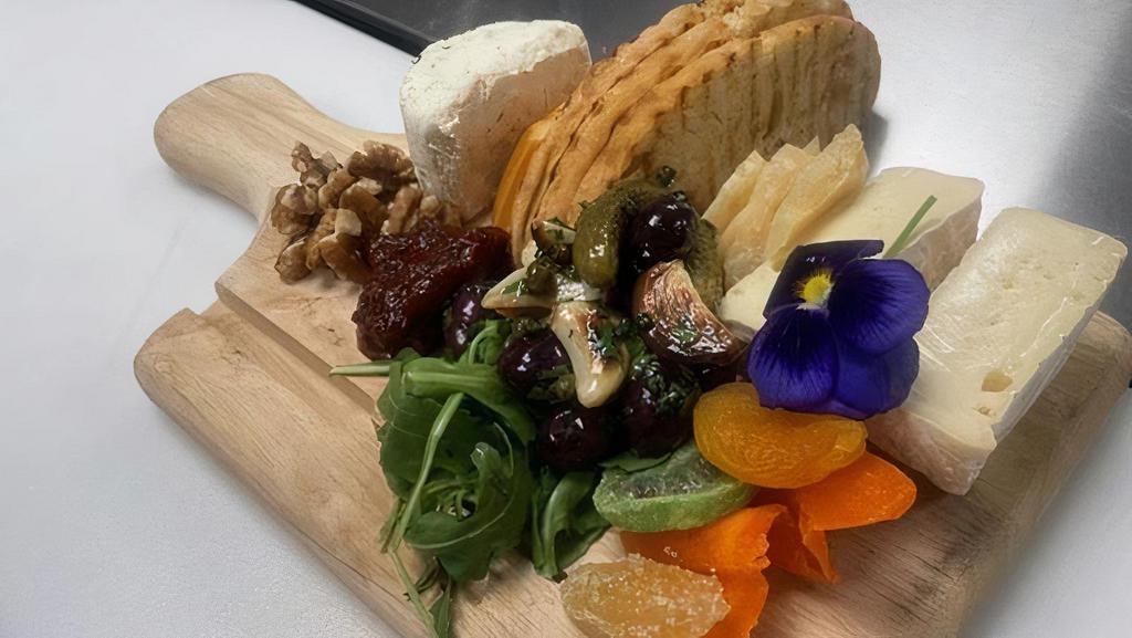 Artisan Cheese · Cheddar, Blue Stilton, Smoked Gouda, Boursin, Brie, Dried Fruits & Nuts, Pepper Jam