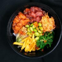 Poke Bowl · Salmon, tuna, spicy crab, seaweed salad, edamame, avocado, mango, cucumber, and rice on the ...