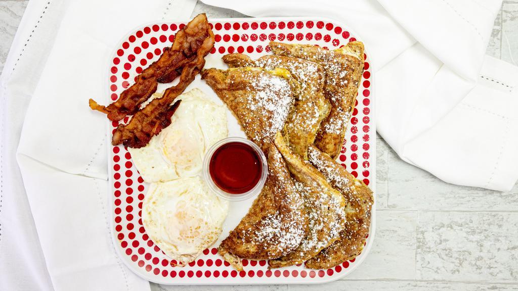 French Toast Plate · served with 2 eggs and 2 slices of bacon.