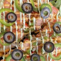 Tuna Pizza · Lightly deep fried tortilla topped spicy tuna, bell peppers, jalapenos, olives, onions and 2...
