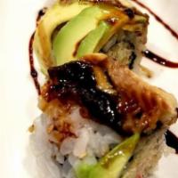 Dragon · Crab meat, avocado, crunchy, topped with avocado and eel.