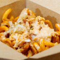 Curly Fry Haystack · take our seasoned curly fries and load ‘em up with jalapeño beer cheese, buttermilk brine fr...