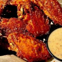 Freebyrd Wings · jumbo wings with your choice of. honey hot | moonshine bbq | alabama white bbq | or sweet an...
