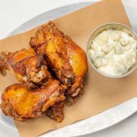 Chicken Wings · House rubbed and smoked - fall off the bone tender with side of bleu cheese.