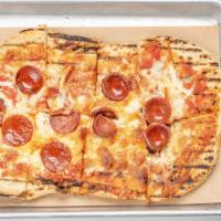 Flatbread · Grilled flatbread topped with red sauce, mozzarella cheese and pepperoni.