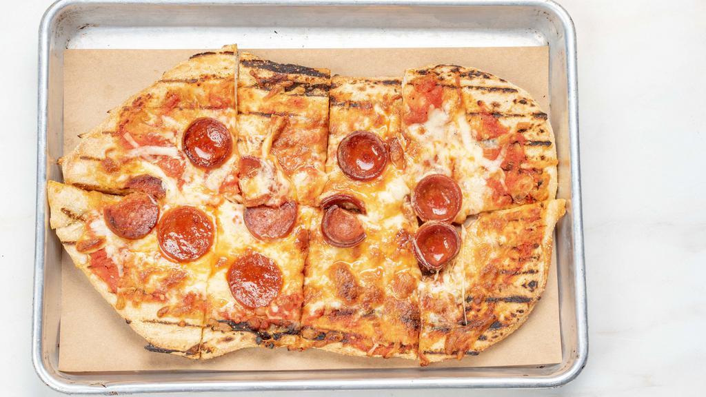 Flatbread · Grilled flatbread topped with red sauce, mozzarella cheese and pepperoni.
