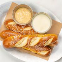Pretzel · Fresh baked Bavarian pretzels (3) brushed with butter and salt. Served with honey mustard an...
