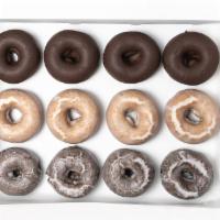 House Pick Of Classic Donuts · A selection of six or 12 of our daily classic simply-glazed donuts - Old Fashioned Glazed, D...