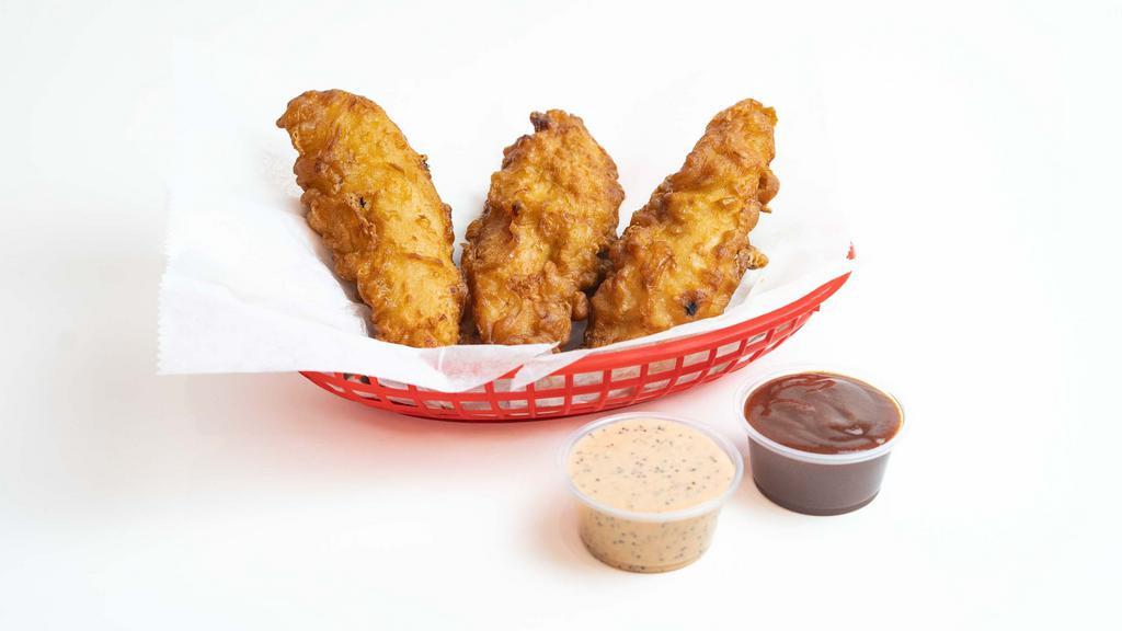 Chicken Tenders · Three hand-battered & twice-fried chicken tenders. Your choice of two sauces.