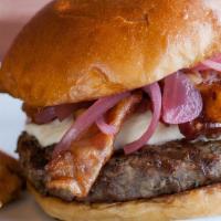 Gouda Burger · Angus beef, with smoked gouda, a sautéed onion and bacon jam on brioche.