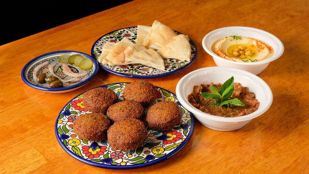Personal Special · Choose three personals: hummus, falafel, baba ghanoush, foul, alayet bandora, french fries, arab salad.  Served with Pita bread.
