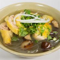 Chicken & Mushrooms With Glass Noodles (Mien Ga) · Glass noodle soup with chicken and shiitake mushrooms garnished with onions and cilantro wit...