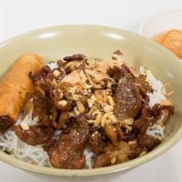Grilled Pork Belly With Spring Roll Over Vermicelli · Contains peanuts.