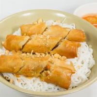 Spring Rolls Over Vermicelli · Contains Peanuts.