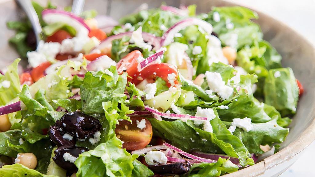 Greek Salad · Feta cheese, black olives, cucumbers, tomatoes, onions on romaine lettuce with balsamic vinaigrette.