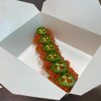 Crispy Rice & Spicy Tuna · Spicy. Spicy Tuna, jalapeno on top of deep-fried rice cake.

This item may contain raw or un...