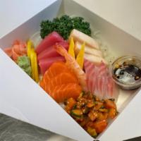 Chirashi Bowl · 12pcs Sashimi, Tamago, Shrimp, Fish Salad.

This item may contain raw or undercooked ingredi...