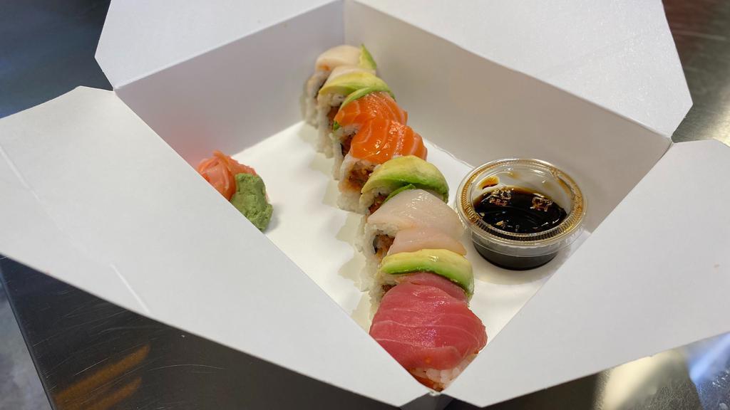 Rainbow2 · Spicy. Spicy tuna roll with raw fish on top.

This item may contain raw or undercooked ingredients or may be cooked to order. Consuming raw or undercooked meats, poultry, seafood, shellfish, or eggs may increase your risk of food-borne illness.