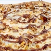 The Bar-B-Q Chicken Pizza · Slow smoked shredded chicken, our signature sweet BBQ sauce and whole- milk mozzarella cheese.