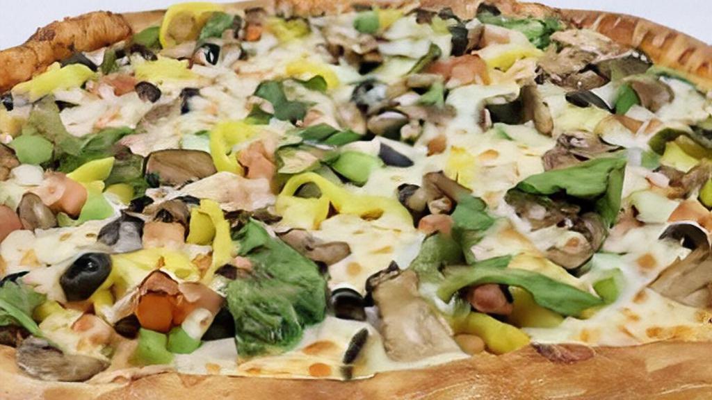 Veggie Pizza · Our scratch dough, topped with our pizza sauce, banana peppers, onions, green peppers, mushrooms,  fresh tomato, black olives, and whole-milk mozzarella.