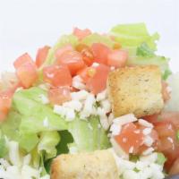 House Salad · Fresh cut romaine  mixed then topped with diced tomato, whole-milk mozzarella and croutons. ...