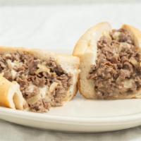 Town Talk Cheesesteak  · Our Signature steak. Made with 1 pound of 100% Ribeye Steak & WITH Fried Onions & Cooper Sha...